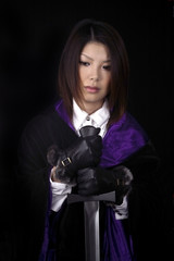 Naklejka premium Asian woman with sword