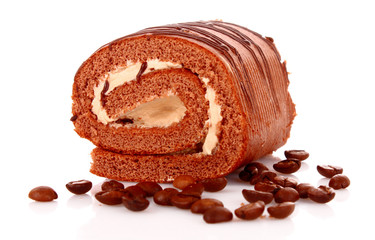 Cake and coffee beans isolated on white