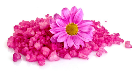 Flower and bath salt on white background