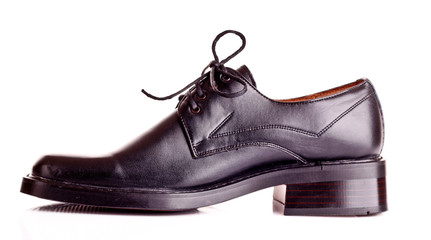 Black shiny man's shoe isolated on white