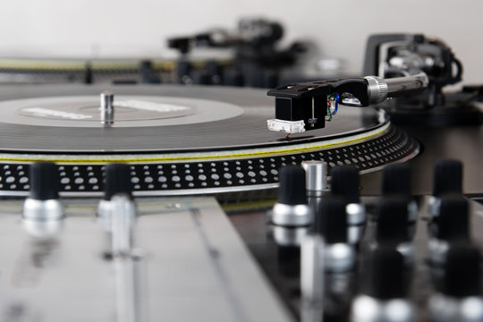 Turntable playing vinyl music record