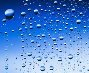 Abstract translucent water drops background, macro view