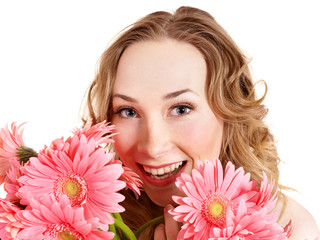 Happy young woman holding flowers.