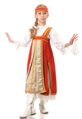 Young girl dancing in national dress