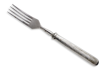 Old silver fork isolated on white background