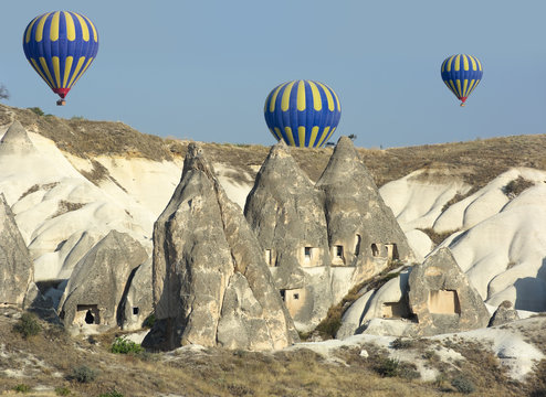 Balloon Over Rock Cave Houses, Cappadocia