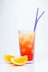 Tequila sunrise with sliced orange.
