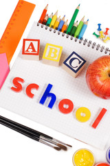 Pencils and apple - concept school