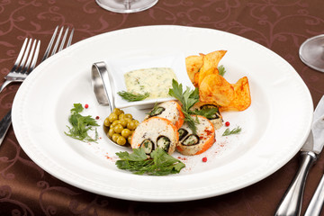 fish roll with sauce and potato chips