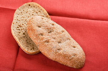 black bread on red close up