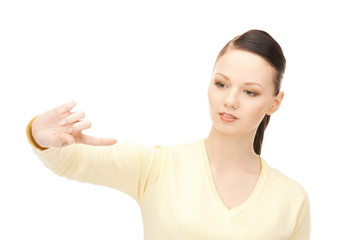 Fototapeta premium businesswoman working with something imaginary