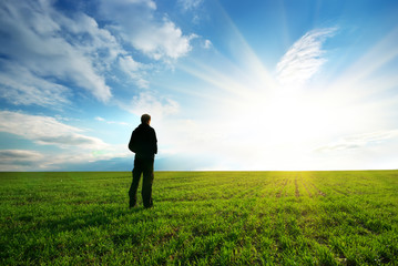 Man in green meadow