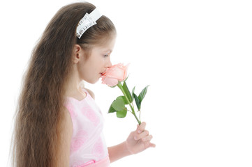 Obraz na płótnie Canvas little girl with a rose.