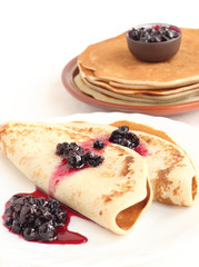 A stack of pancakes on a plate