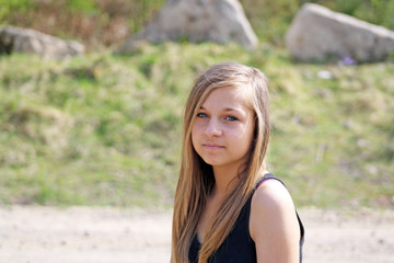 Naklejka premium pretty teenage girl in the woods 3