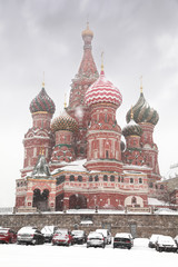 Car parking near St. Basil Temple in Moscow, Russia at winter
