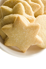 Star shaped homemade cookies in a white plate