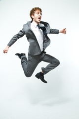 young businessman jumping
