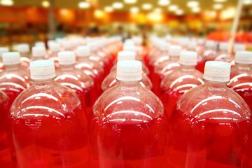 assembly line bottle red liquid rows lines