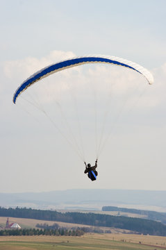 Paraglider silhouette during the spring