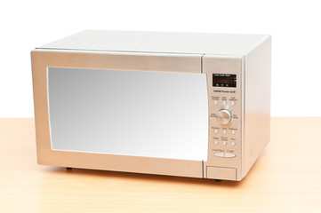 Fototapeta premium Microwave oven on the table