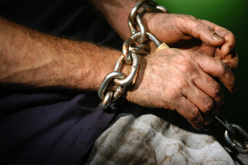 Chained person.