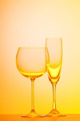 Wine glasses against gradient background