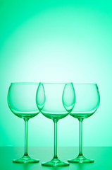 Wine glasses against gradient background