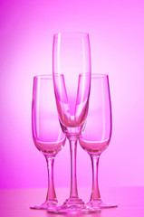 Wine glasses against gradient background