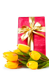 Celebration concept - gift box and tulip flowers