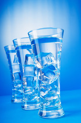 Water in the glass against gradient background