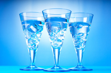 Water in the glass against gradient background