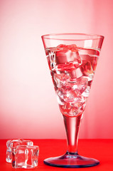 Water in the glass against gradient background