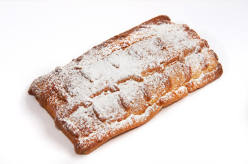 Cake with icing sugar isolated