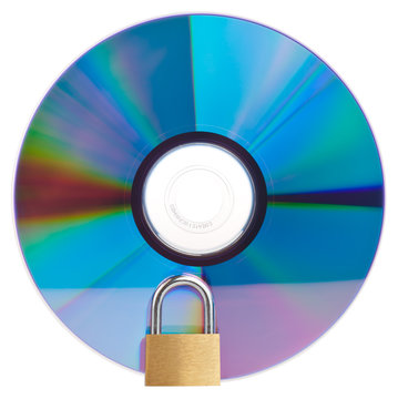 CD or DVD with a closed padlock on top isolated on white with cl