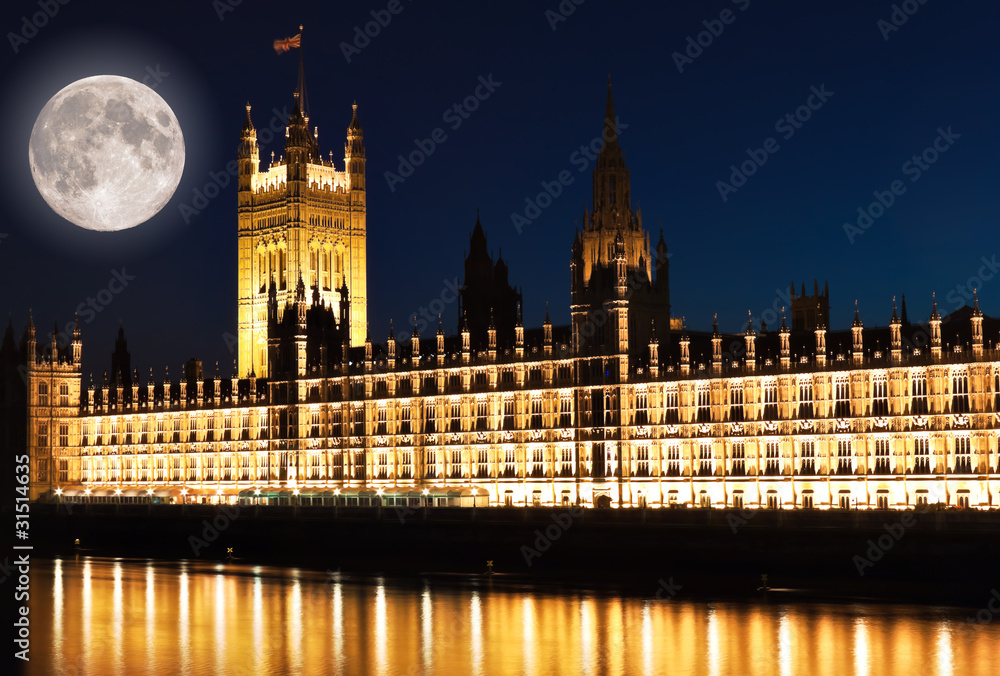 Wall mural the houses of parliament in london with a bright moon