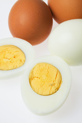 Hard boiled eggs on white background