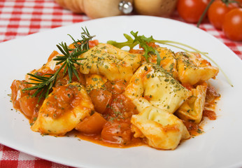Italian tortellini pasta with tomato sauce
