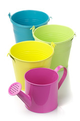 Colorful buckets and watering can