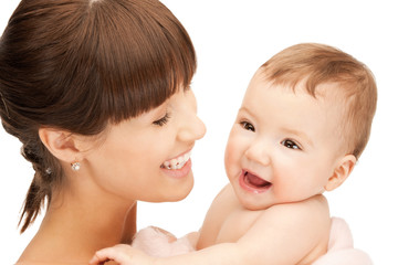 Obraz na płótnie Canvas happy mother with adorable baby