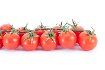 Cherry tomatoes on white background