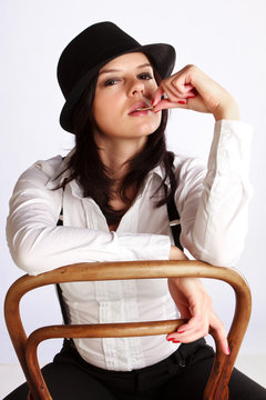 Gangster-girl sitting on chair