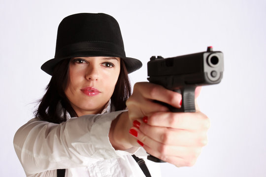 Gangster-girl aiming with the gun