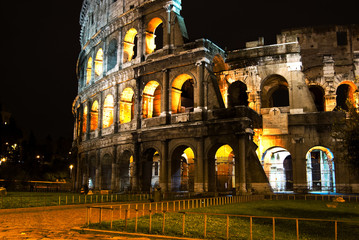 Fototapeta premium Rome Coliseum by night illuminated, Colosseo Italy