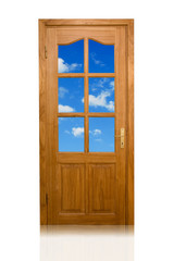 wooden door to the blue sky with white clouds