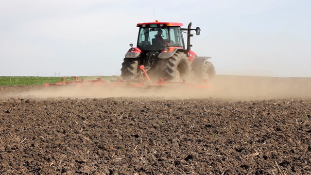 Tractor tillage a field