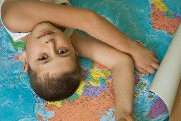 Boy with a world map