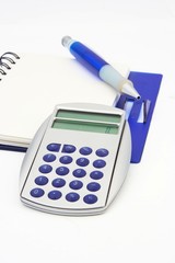 A book, pencil and calculator