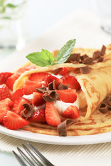 Crepes with sweet cheese and strawberries