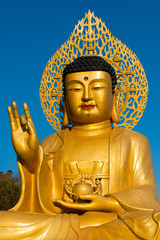 Golden Buddha statue at buddhist temple of Sanbanggulsa at Sanba